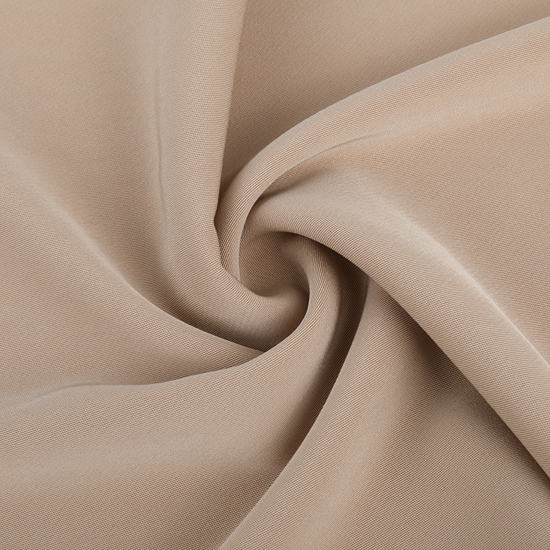 Imitation acetate fabric is a cellulose-based material designed to replicate the luxurious look